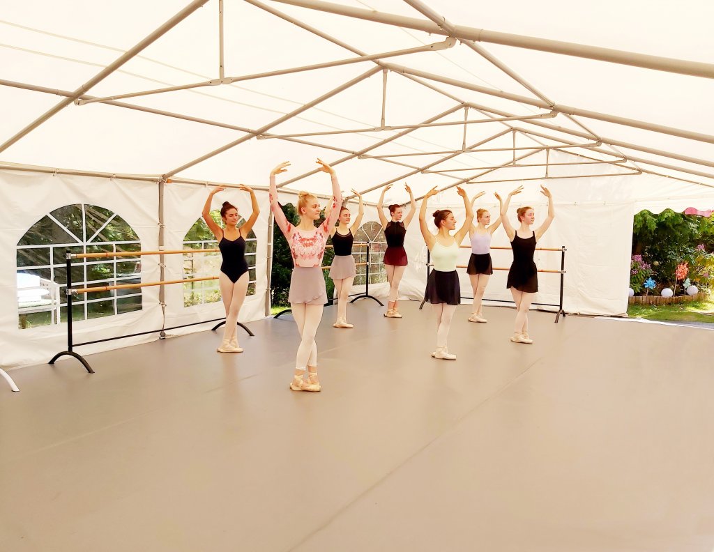 Ballet class inside the marquee