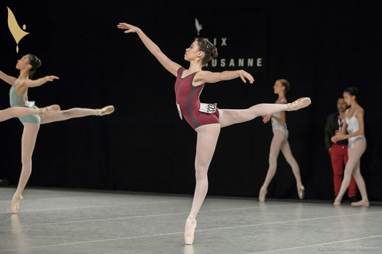 Detail of a young ballerina performing at the competition