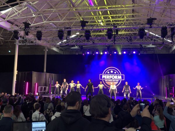 Adam Garcia performing with Prodijig on a Harlequin floor