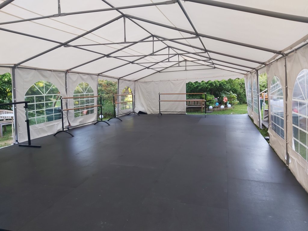 The marquee with the finished Harlequin dance floor and ballet barres