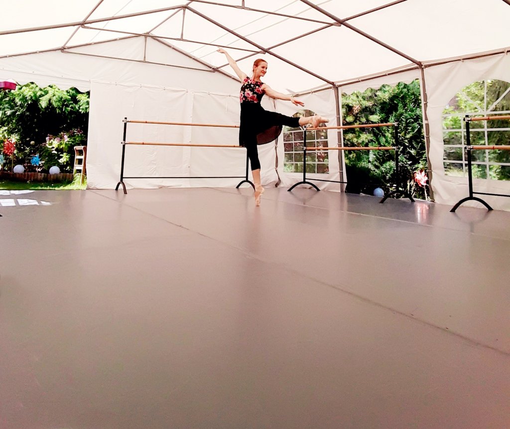 Franziska Rengger dancing on her new outdoor dance floor from Harlequin